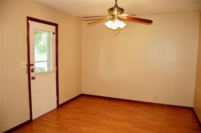 407 Hithergreen Dr, Lansing, KS 66043 - unfurnished room featuring a ceiling fan and light wood-style flooring