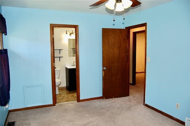 407 Hithergreen Dr, Lansing, KS 66043 - unfurnished bedroom with carpet flooring, ensuite bathroom, and a ceiling fan