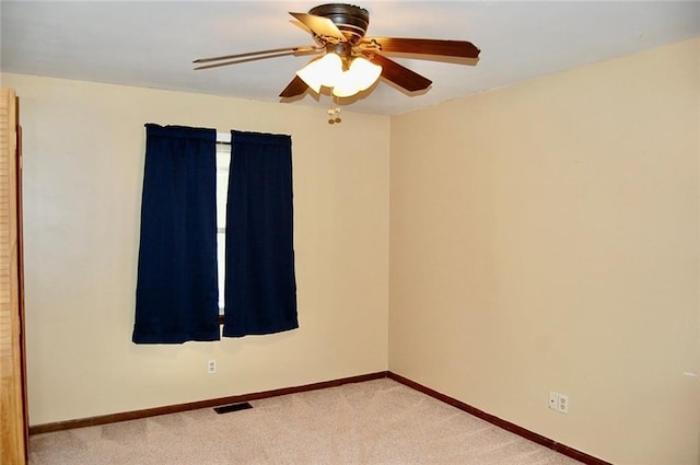 407 Hithergreen Dr, Lansing, KS 66043 - carpeted spare room featuring ceiling fan and baseboards