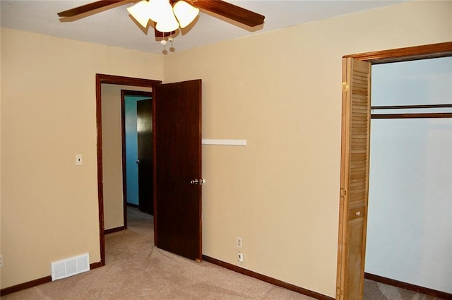 407 Hithergreen Dr, Lansing, KS 66043 - unfurnished bedroom with carpet flooring, a closet, and ceiling fan