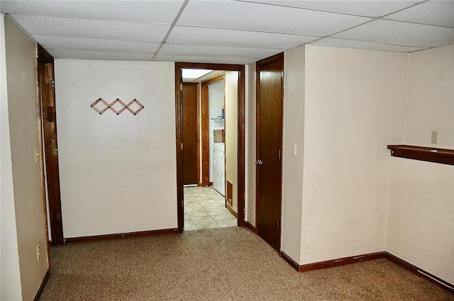 407 Hithergreen Dr, Lansing, KS 66043 - hall with washer / clothes dryer, a drop ceiling, and carpet floors