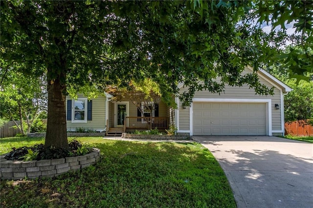 1039 Woodson Cir, Gardner, KS 66030 - obstructed view of property with driveway, a garage, and a porch