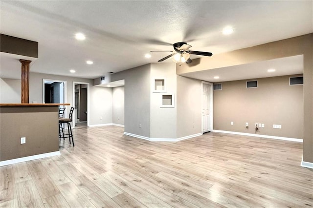 1039 Woodson Cir, Gardner, KS 66030 - unfurnished living room featuring recessed lighting, light wood-style flooring, and ceiling fan