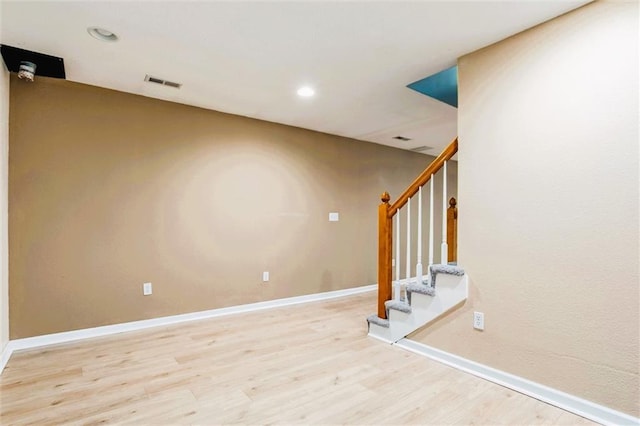 1039 Woodson Cir, Gardner, KS 66030 - interior space with wood finished floors and recessed lighting