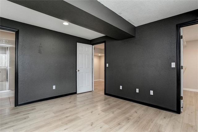 1039 Woodson Cir, Gardner, KS 66030 - unfurnished room featuring light wood-style flooring and baseboards