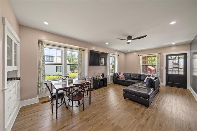 1340 Spruce St, Leavenworth, KS 66048 - living area featuring wood finished floors, a ceiling fan, and recessed lighting