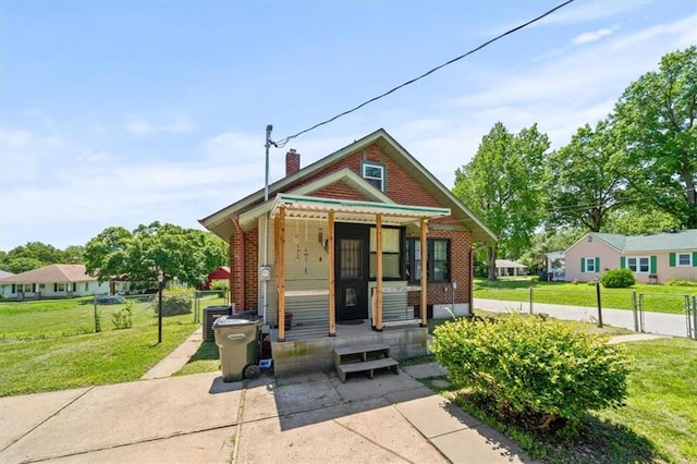 1340 Spruce St, Leavenworth, KS 66048 - view of front of property with a chimney and brick siding