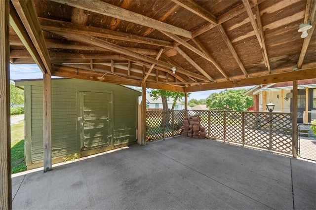 1340 Spruce St, Leavenworth, KS 66048 - view of patio featuring a storage unit