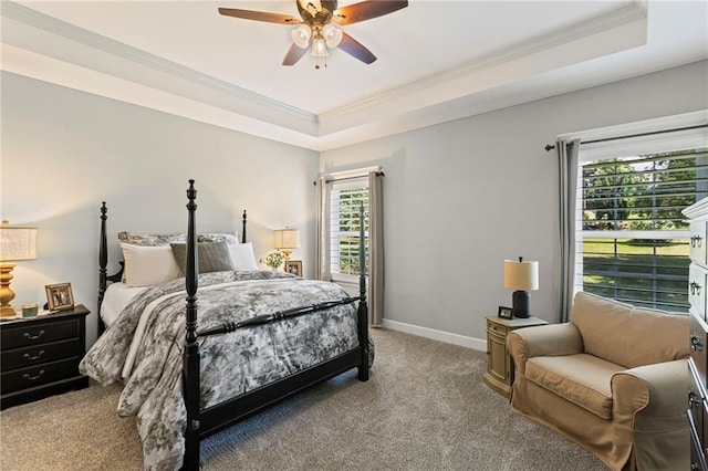 801 155th Ter, Basehor, KS 66007 - bedroom with a tray ceiling, light colored carpet, ornamental molding, and a ceiling fan