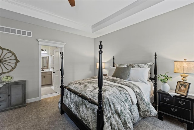801 155th Ter, Basehor, KS 66007 - bedroom with carpet flooring, ensuite bath, crown molding, and ceiling fan
