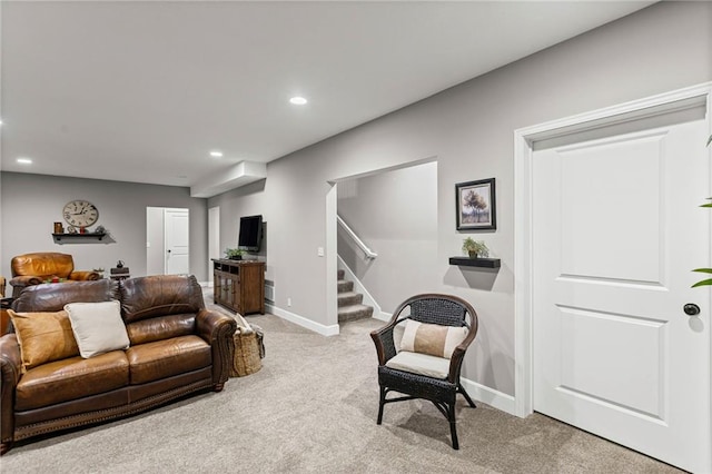 801 155th Ter, Basehor, KS 66007 - living area featuring light carpet, stairs, and recessed lighting