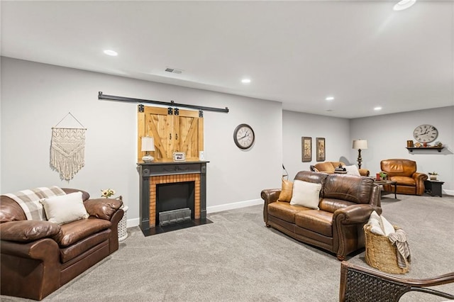 801 155th Ter, Basehor, KS 66007 - carpeted living area with recessed lighting and a barn door