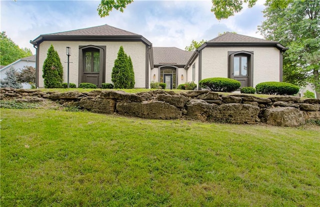 12600 Mohawk Ln, Leawood, KS 66209 - view of front facade featuring a front yard and stucco siding