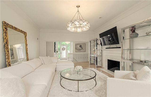 12600 Mohawk Ln, Leawood, KS 66209 - living area with ornamental molding, wood finished floors, and a fireplace