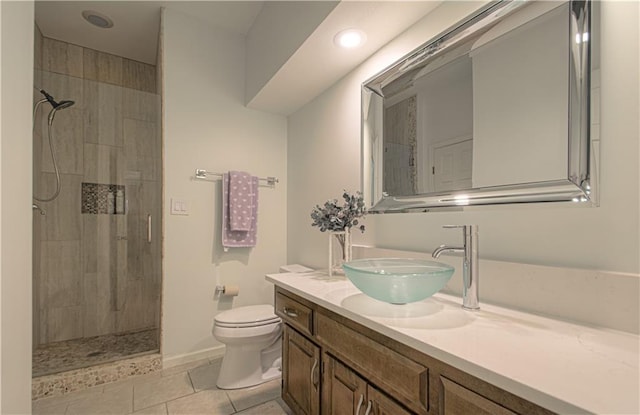 12600 Mohawk Ln, Leawood, KS 66209 - full bath featuring vanity, a tile shower, tile patterned floors, and recessed lighting