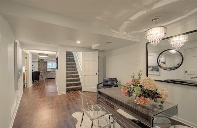 12600 Mohawk Ln, Leawood, KS 66209 - dining area with dark wood-style floors, stairway, and a chandelier