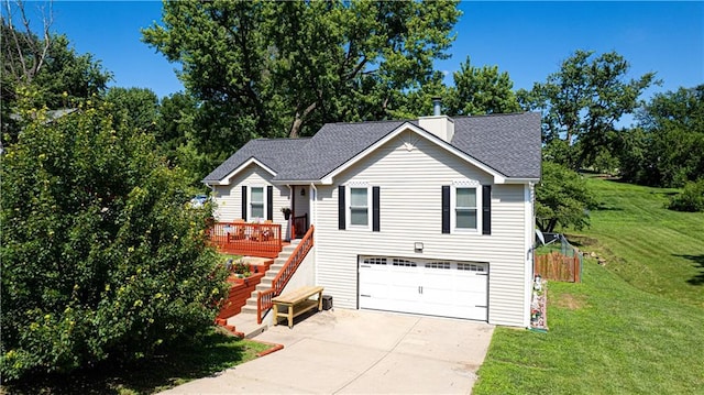 203 Scout St, Camden Point, MO 64018 - view of front of house with driveway, an attached garage, a front yard, roof with shingles, and stairs