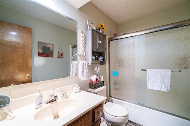 203 Scout St, Camden Point, MO 64018 - bathroom featuring vanity, enclosed tub / shower combo, and a textured ceiling