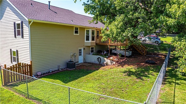 203 Scout St, Camden Point, MO 64018 - rear view of house with a wooden deck, a fenced backyard, roof with shingles, and stairway