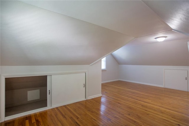 7236 Roe Ave, Prairie Village, KS 66208 - bonus room with hardwood / wood-style floors and lofted ceiling