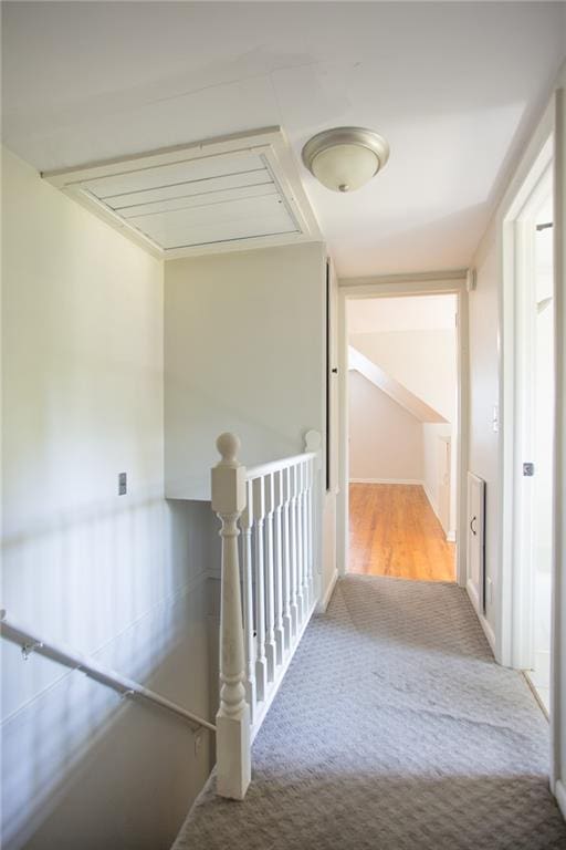 7236 Roe Ave, Prairie Village, KS 66208 - hallway with carpet and an upstairs landing