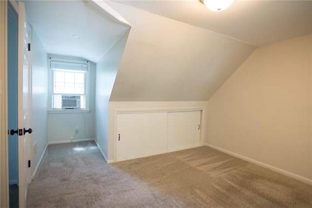 7236 Roe Ave, Prairie Village, KS 66208 - additional living space with vaulted ceiling, carpet flooring, and cooling unit
