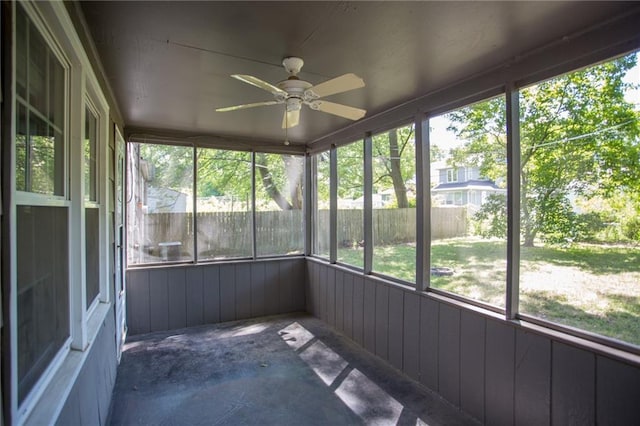 7236 Roe Ave, Prairie Village, KS 66208 - unfurnished sunroom featuring ceiling fan and plenty of natural light
