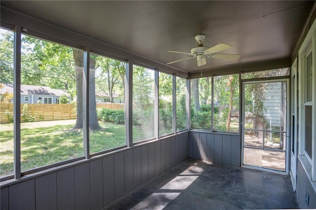 7236 Roe Ave, Prairie Village, KS 66208 - unfurnished sunroom with a ceiling fan