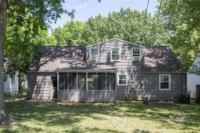7236 Roe Ave, Prairie Village, KS 66208 - back of house featuring a sunroom, roof with shingles, and a chimney