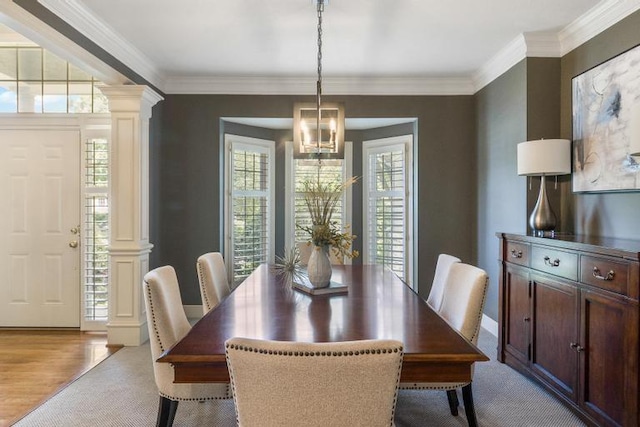 5125 W 164th St, Overland Park, KS 66085 - dining room featuring decorative columns and crown molding