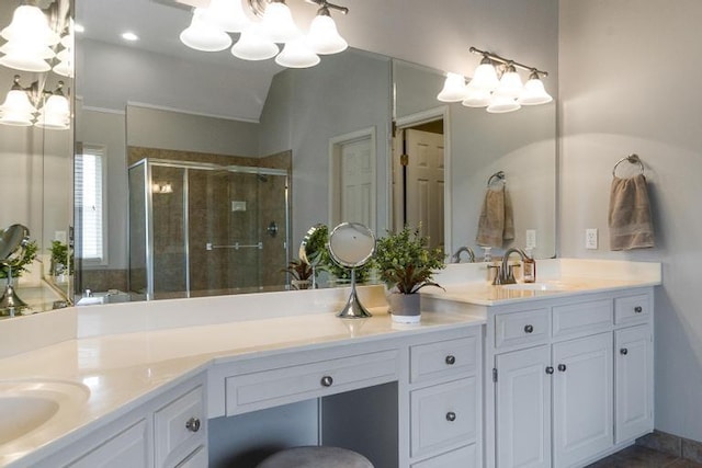 5125 W 164th St, Overland Park, KS 66085 - full bath featuring double vanity, a chandelier, and a shower stall