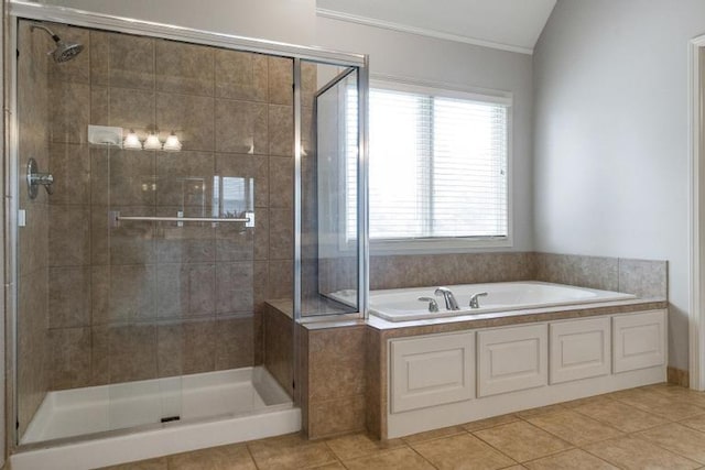 5125 W 164th St, Overland Park, KS 66085 - full bathroom featuring a shower stall, a garden tub, tile patterned floors, and crown molding