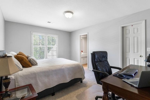 5125 W 164th St, Overland Park, KS 66085 - bedroom featuring light carpet, a desk, and ensuite bath