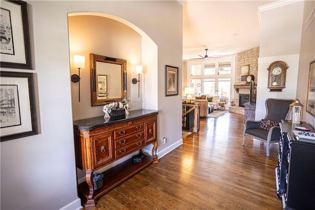 4500 Parks Summit Ter, Lees Summit, MO 64064 - hallway with arched walkways and dark wood-style flooring