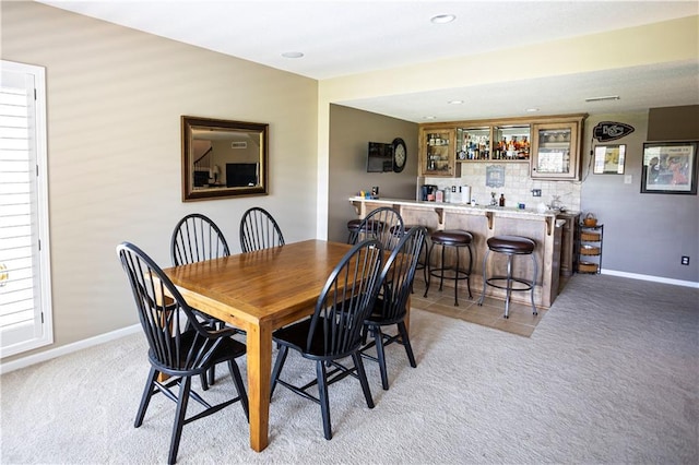 4500 Parks Summit Ter, Lees Summit, MO 64064 - dining room featuring bar with sink, light carpet, and recessed lighting