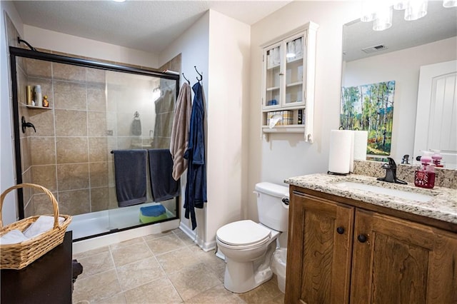 4500 Parks Summit Ter, Lees Summit, MO 64064 - bathroom with vanity, a stall shower, and a textured ceiling