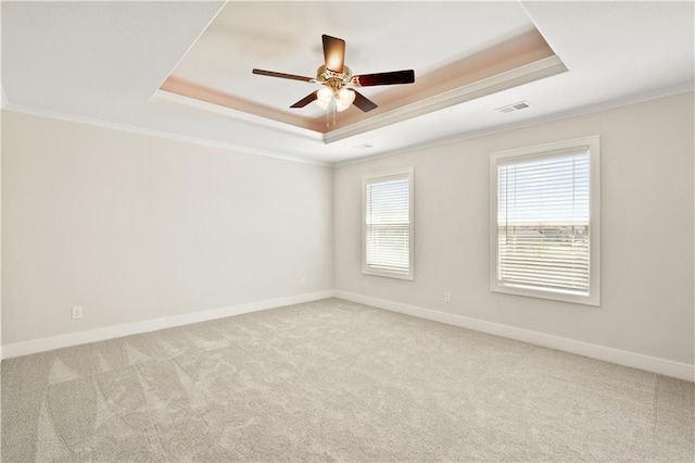 28400 W 161st Ter, Gardner, KS 66030 - carpeted spare room with a raised ceiling, plenty of natural light, crown molding, and ceiling fan