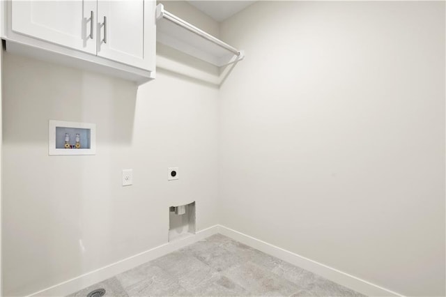 28400 W 161st Ter, Gardner, KS 66030 - washroom featuring cabinet space, hookup for an electric dryer, washer hookup, and light colored carpet