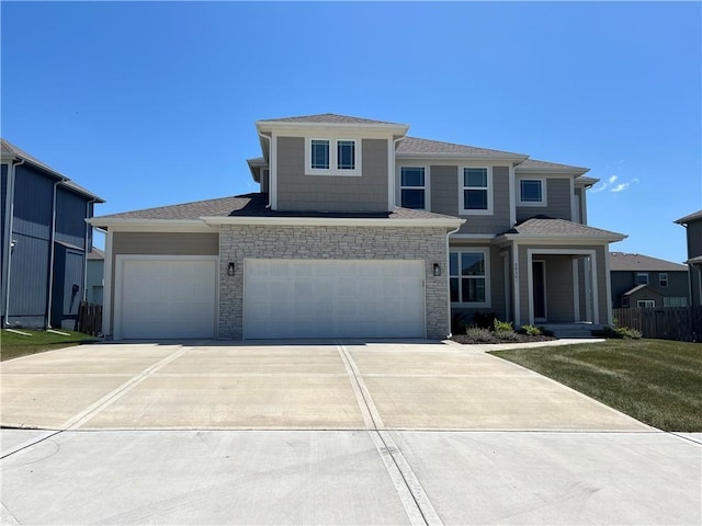 28501 W 161st Ter, Gardner, KS 66030 - prairie-style house featuring concrete driveway and an attached garage