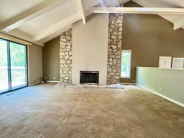 6960 Dancaster Rd, Topeka, KS 66610 - unfurnished living room featuring carpet floors, beamed ceiling, high vaulted ceiling, and a stone fireplace