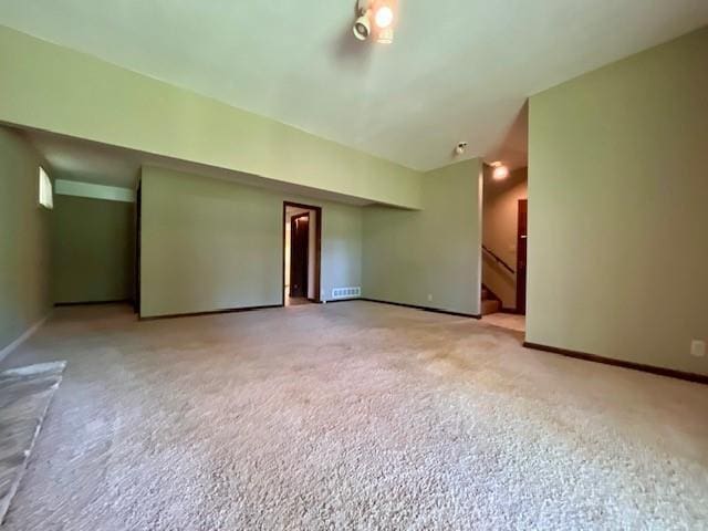 6960 Dancaster Rd, Topeka, KS 66610 - spare room with baseboards and light carpet