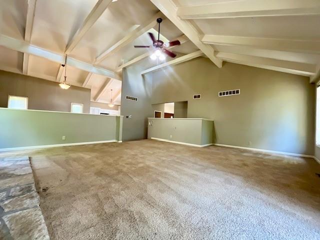 6960 Dancaster Rd, Topeka, KS 66610 - unfurnished living room with ceiling fan and carpet