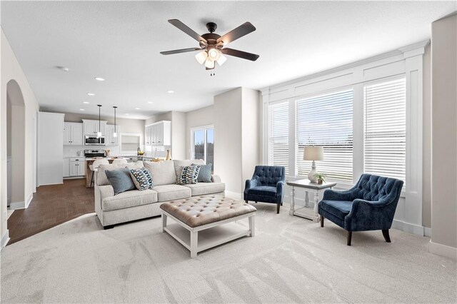 28225 W 162nd Ter, Gardner, KS 66030 - living area featuring a ceiling fan, recessed lighting, carpet, and arched walkways