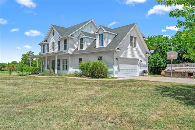 1148 N 1st Rd, Baldwin City, KS 66006 - view of front of property with a garage, driveway, roof with shingles, and a front lawn