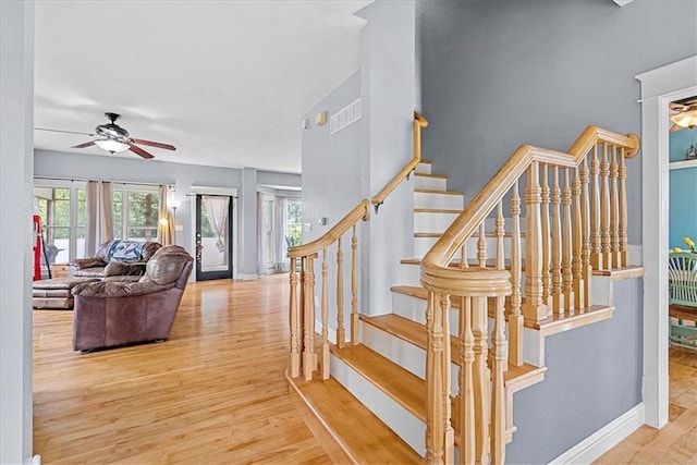 1148 N 1st Rd, Baldwin City, KS 66006 - stairway with wood finished floors and a ceiling fan