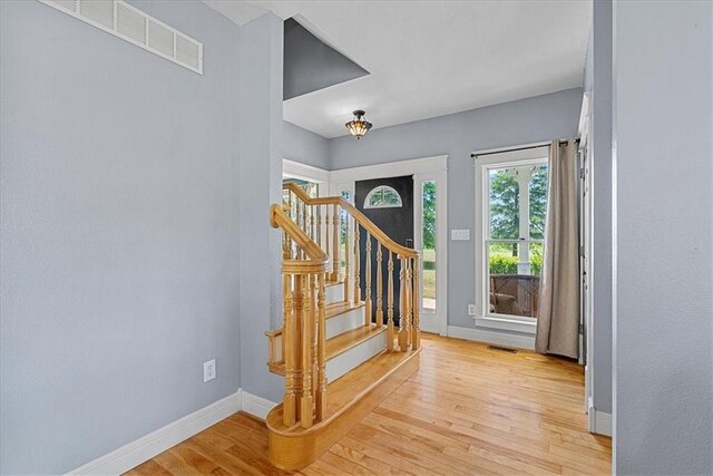 1148 N 1st Rd, Baldwin City, KS 66006 - entrance foyer featuring light wood-style floors and stairs