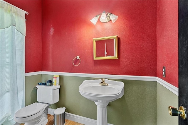 1148 N 1st Rd, Baldwin City, KS 66006 - bathroom with wood finished floors and toilet