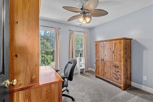 1148 N 1st Rd, Baldwin City, KS 66006 - carpeted home office featuring baseboards and a ceiling fan