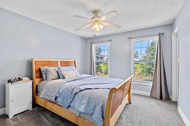 1148 N 1st Rd, Baldwin City, KS 66006 - carpeted bedroom featuring baseboards and ceiling fan