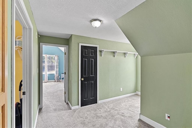 1148 N 1st Rd, Baldwin City, KS 66006 - additional living space featuring a textured ceiling and carpet flooring